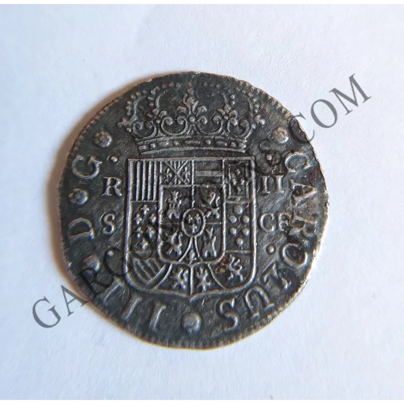 Carlos III 2 Reales sevilla CF 1770 Perdida por oxidación marina del  Peso a  3.86 gr